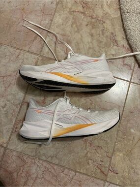Asics Women's White Running Shoes with Yellow and Pink Accents